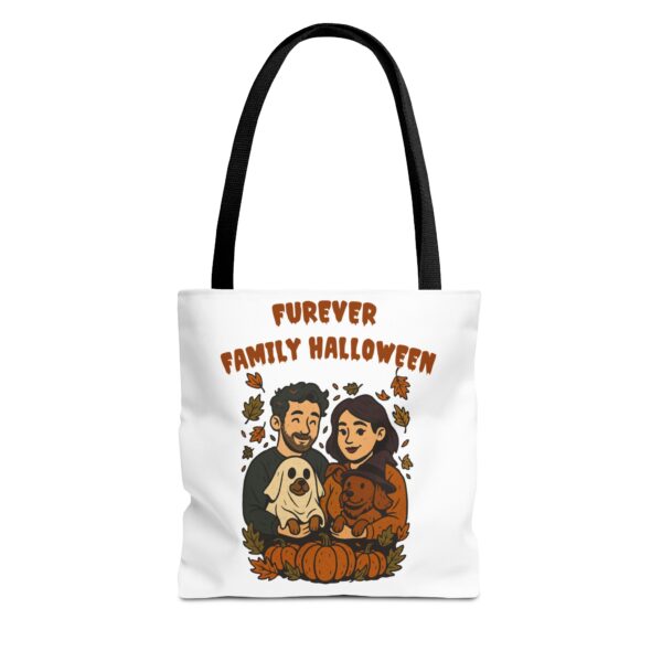 Couple holding dogs dressed as ghost and witch with Furever Family Halloween quote